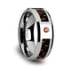 10 mm tungsten ring with a black and orange carbon fiber inlay and an orange padparadscha setting